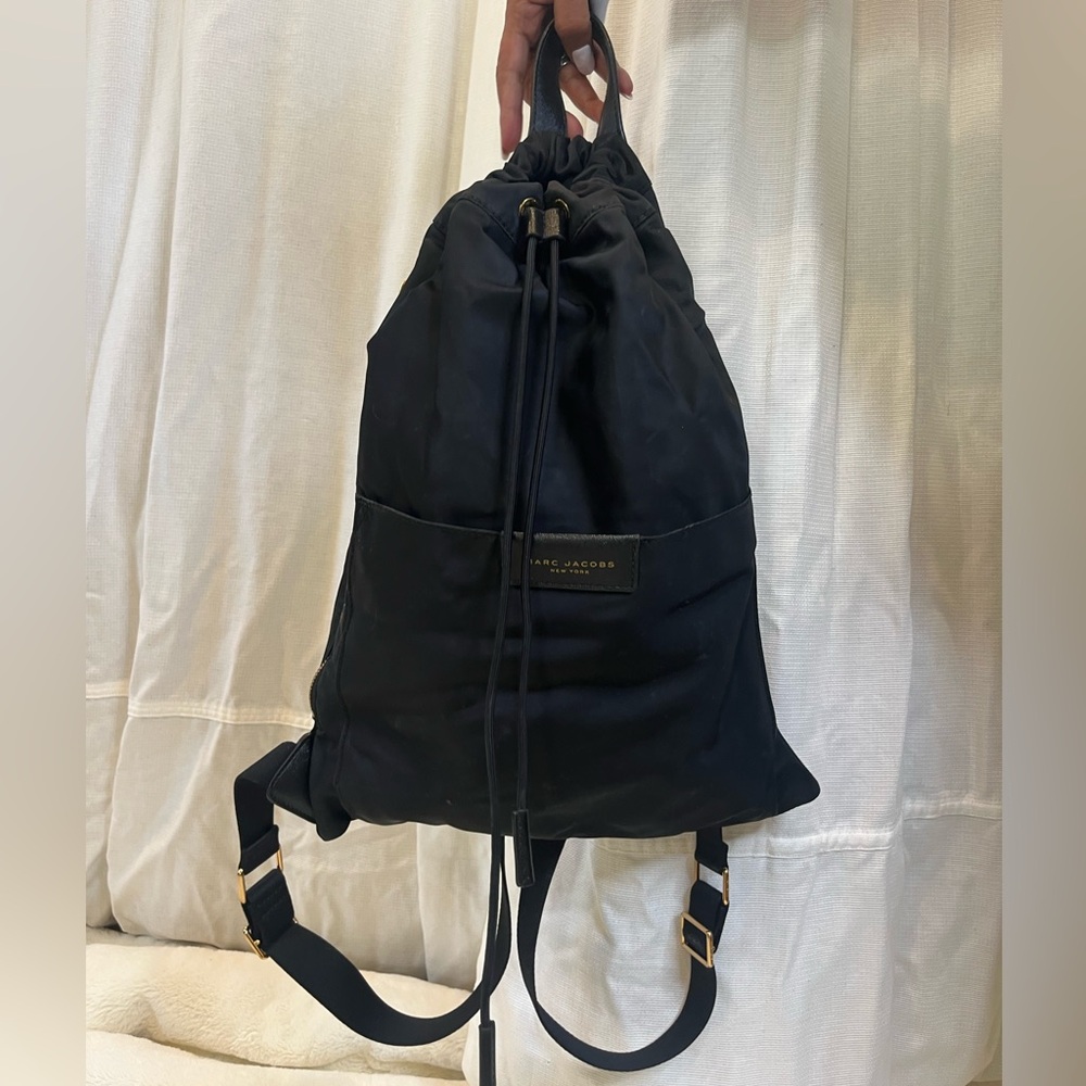 blck marc jacobs backpack, gold details, adjustable straps & drawstring closure